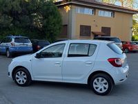 Usata Dacia Sandero Lauréate 75 CV (55 kW) 2014 Bianco Berlina
