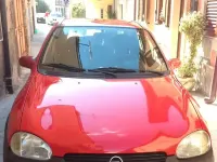 Usata Opel Corsa Edition 54 CV (39 kW) 2000 Rosso Berlina