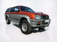 Occasion Mitsubishi L200 101 ch (74 kW) 2000 Orange Pick-up