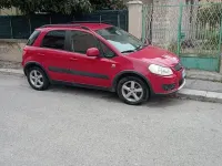 Usata Suzuki SX4 90 CV (66 kW) 2009 Rosso Station wagon