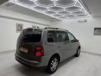 Begagnad VW Touran Highline 150 HK (110 kW) 2010 Grå Minibuss