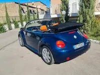 Usata VW New Beetle 116 CV (85 kW) 2004 Blu Utilitaria
