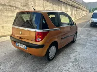 Usata Peugeot 1007 73 CV (53 kW) 2005 Arancione Monovolume