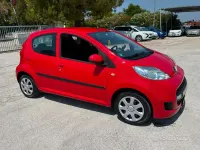 Usata Peugeot 107 68 CV (50 kW) 2011 Rosso Utilitaria