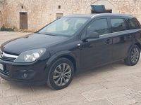 Usata Opel Astra 110 CV (80 kW) 2010 Nero Station wagon