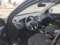 Käytetty Hyundai ix35 115 HP (84 kW) 2010 Musta Katumaasturi