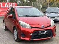 Usata Toyota Yaris Hybrid Lounge 75 CV (55 kW) 2013 Arancione Berlina