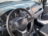 Usata Suzuki Swift 93 CV (68 kW) 2012 Bianco Utilitaria