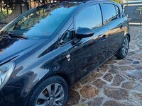 Usata Opel Corsa 95 CV (69 kW) 2010 Nero Berlina
