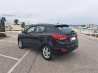 Käytetty Hyundai ix35 115 HP (84 kW) 2010 Musta Katumaasturi