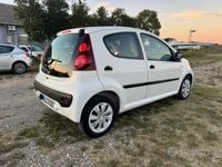 Usata Peugeot 107 68 CV (50 kW) 2013 Bianco Utilitaria
