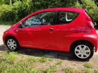 Käytetty Peugeot 107 68 HP (50 kW) 2010 Punainen Viistoperä