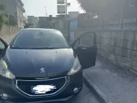 Usata Peugeot 208 68 CV (50 kW) 2013 Grigio Utilitaria