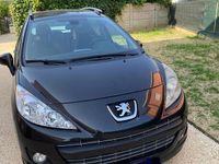 Gebraucht Peugeot 207 90 PS (66 kW) 2011 Schwarz Kombi
