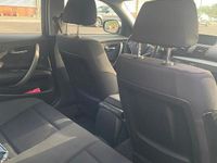 Begagnad BMW 2000 2010 Svart Sedan