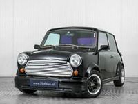Begagnad Mini Cooper 63 HK (46 kW) 1993 Svart Halvkombi