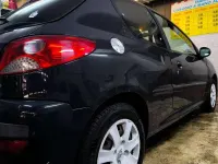 Usata Peugeot 206 60 CV (44 kW) 2011 Nero Berlina