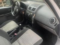 Usata Suzuki SX4 107 CV (78 kW) 2013 Bianco Berlina