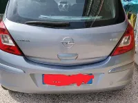 Usata Opel Corsa 80 CV (58 kW) 2010 Grigio Utilitaria