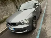 Usata BMW 116 122 CV (89 kW) 2010 Grigio Utilitaria