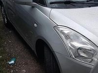 Begagnad Suzuki Swift 75 HK (55 kW) 2011 Grå Halvkombi