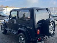 Usata Jeep Wrangler Laredo 103 CV (75 kW) 1990 Nero SUV
