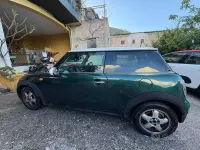 Begagnad Mini Cooper D 109 HK (80 kW) 2007 Grön Halvkombi