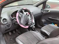 Używany Opel Corsa 85 KM (62 kW) 2012 Czerwony Hatchback