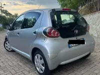 Usata Toyota Aygo 68 CV (50 kW) 2011 Grigio Utilitaria