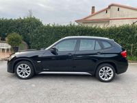 Usata BMW X1 143 CV (105 kW) 2012 Nero pastello SUV