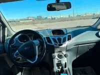 Usado Ford Fiesta 82 HP (60 kW) 2009 Cinzento Sedan