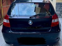 Usata BMW 118 122 CV (89 kW) 2006 Nero Utilitaria