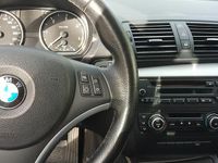 Usata BMW 118 122 CV (89 kW) 2009 Nero Utilitaria