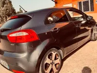 Usata Kia Rio 90 CV (66 kW) 2013 Grigio Berlina