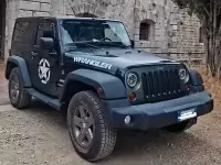 Begagnad Jeep Wrangler Sahara 200 HK (147 kW) 2012 Svart SUV