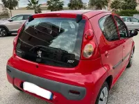 Usata Peugeot 107 68 CV (50 kW) 2009 Rosso Utilitaria