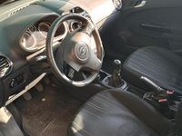 Usata Opel Corsa 69 CV (50 kW) 2010 Nero Berlina