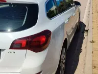 Usata Opel Astra 110 CV (80 kW) 2011 Bianco Station wagon