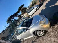 Usata VW New Beetle 105 CV (77 kW) 2005 Grigio Utilitaria