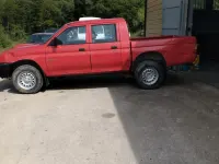 Occasion Mitsubishi L200 100 ch (73 kW) 1999 Rouge Pick-up