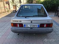 Usata Ford Escort 60 CV (44 kW) 1987 Grigio Berlina