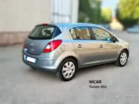 Usata Opel Corsa Cosmo 65 CV (47 kW) 2011 Grigio Utilitaria