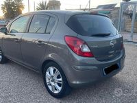 Usata Opel Corsa Cosmo 75 CV (55 kW) 2011 Marrone Utilitaria