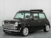 Begagnad Mini Cooper 58 HK (42 kW) 1998 Svart Halvkombi