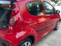 Usata Peugeot 107 68 CV (50 kW) 2009 Rosso Utilitaria