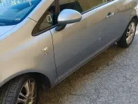 Usata Opel Corsa Edition 75 CV (55 kW) 2011 Grigio Utilitaria