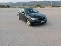 Usata BMW 120 177 CV (130 kW) 2010 Nero Utilitaria