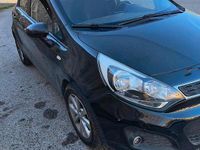 Usata Kia Rio Active 84 CV (61 kW) 2013 Nero Berlina