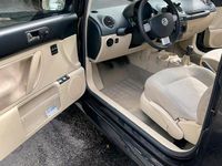 Usata VW New Beetle 102 CV (75 kW) 2008 Nero Utilitaria