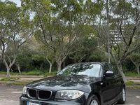 Usata BMW 116 115 CV (84 kW) 2010 Nero Utilitaria